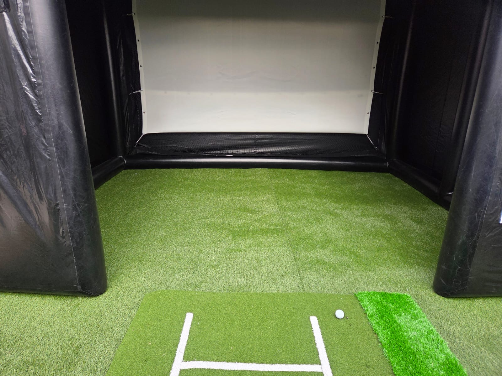Inside view of the Golf Junkies simulator bay